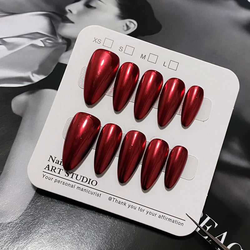 Red chrome almond press-on nails for party season
