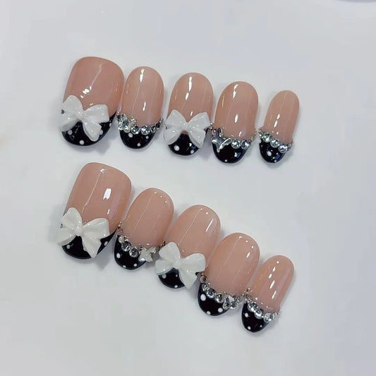 10pcs high-end Simple yet luxurious style, featuring a three-dimensional bowknot and dazzling stacked diamond handmade fake nail