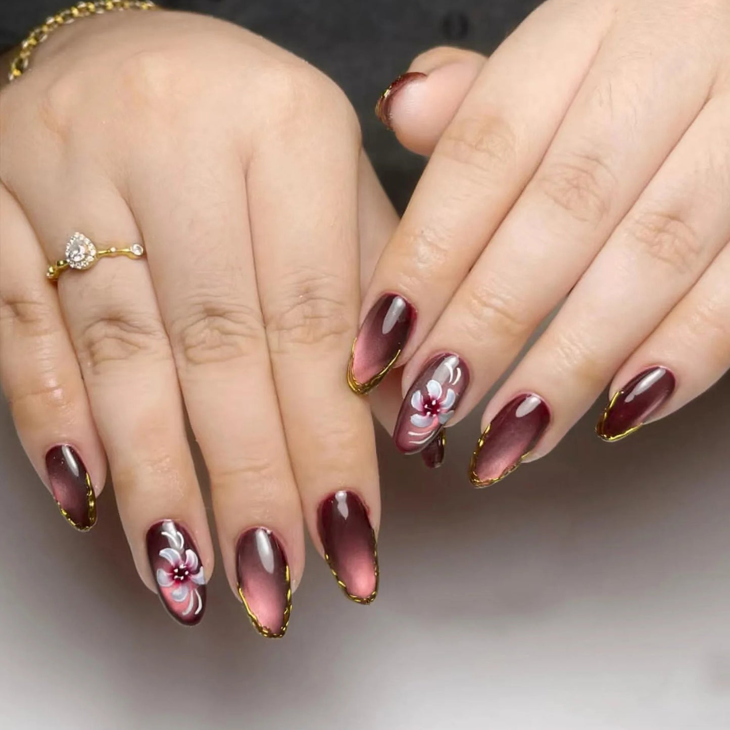 24pcs Almond False Nails Spring Summer Stick on Purple Cat's Eye Press on Nails Oval Fake Nail Flower Gold Leaf Design Manicure