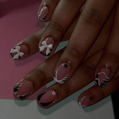 24pcs Press on Nails Short Almond Bowknot Black Press on Nails White Pearl Sweet French Tip Press on Nails Cute Nail Artificial
