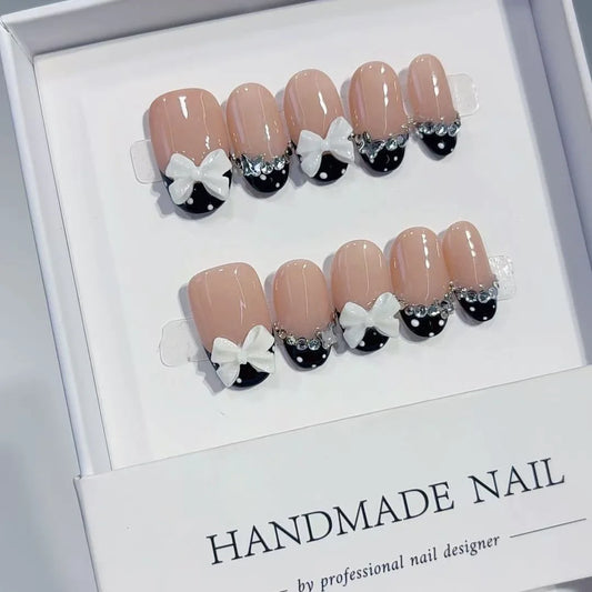 10pcs high-end Simple yet luxurious style, featuring a three-dimensional bowknot and dazzling stacked diamond handmade fake nail