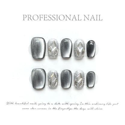 10Pcs Dark Blue Cat Eye Press on Nails Wearable Round Head Oval Nail Tips with Diamonds Full Cover Acrylic Nails Short Nail Art