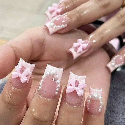 24pcs Press on Nails Short Almond Bowknot Black Press on Nails White Pearl Sweet French Tip Press on Nails Cute Nail Artificial