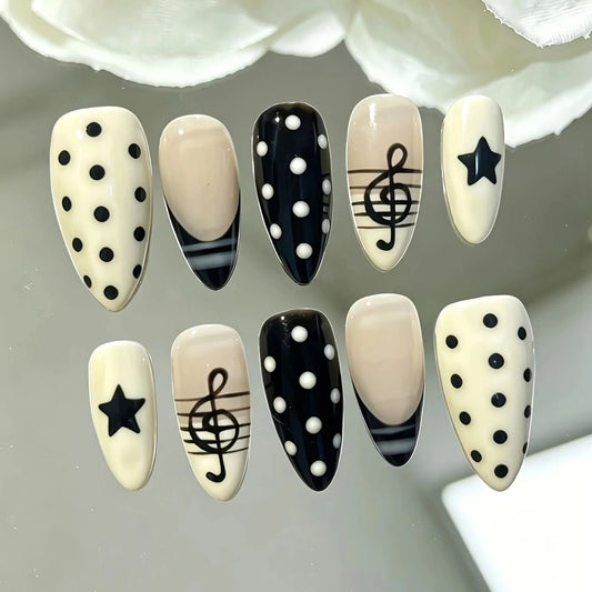 10 pieces of hand pressed almond shaped nails, beautiful fake nails, milky white black polka dot music, suitable for women to us