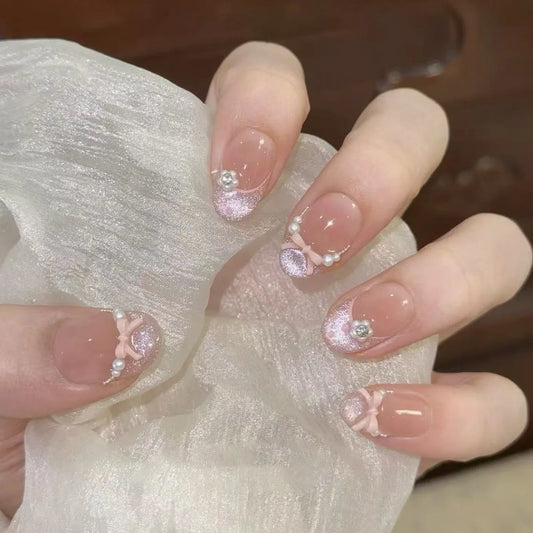 24pcs Glitter Tips Fake Nails Cat's Eye French Pink Short Almond Press on False Nails with Bow Pearl Design Wearable Manicure