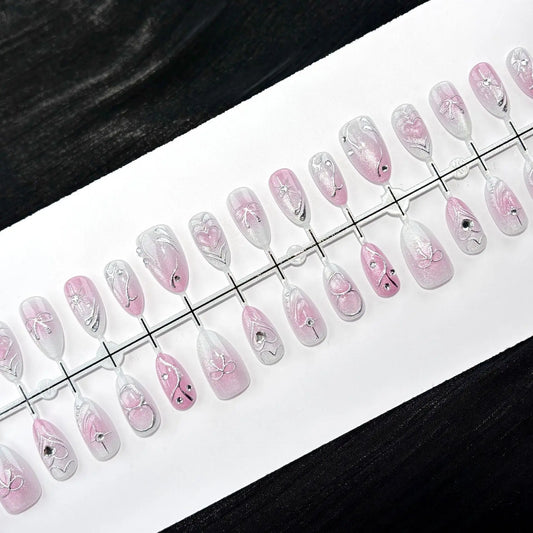 24PCS Press on Nails Pink White Gradient Cat Eye with Silver Outline Heart Bow Fake Nials Cross Design Rhinestone Sweet Manicure