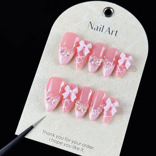 10pcs high-end Sweet girl style, hand-painted three-dimensional bow, shiny small pearls handmade fake nails